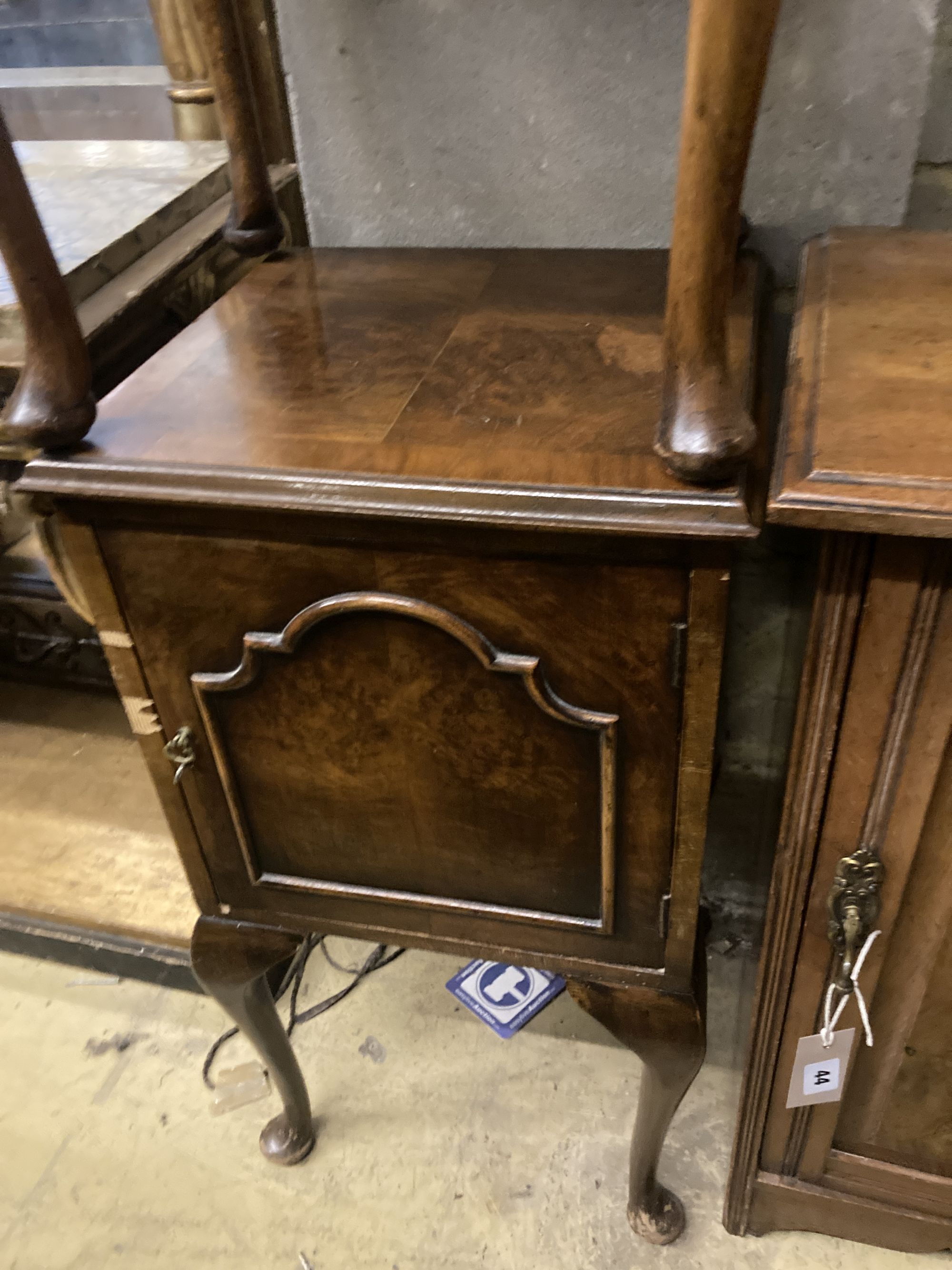 A late Victorian walnut bedside cabinet, width 40cm depth 36cm height 73cm, together with a pair of Queen Anne Revival walnut bedside c